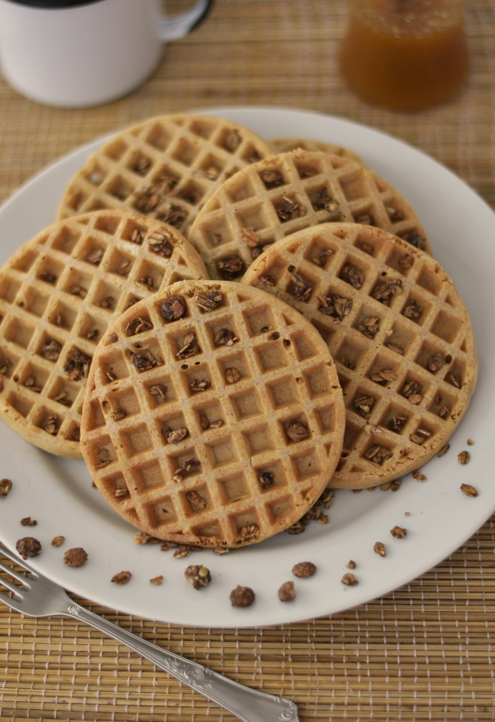 Belgian waffle topped with crushed nuts