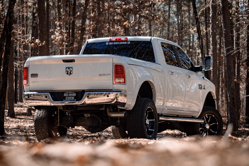 Lifted white pickup truck
