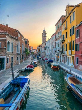 boats on water near buildings