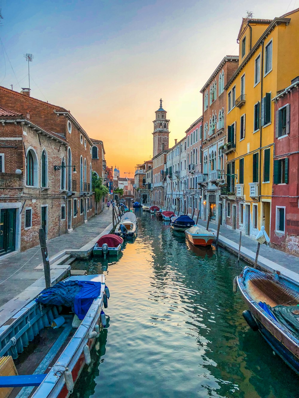 boats on water near buildings