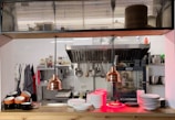 A professional organizing a kitchen space efficiently.