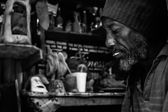 A candid photo of Carl Siegler deeply focused while working on a creative project in his studio.