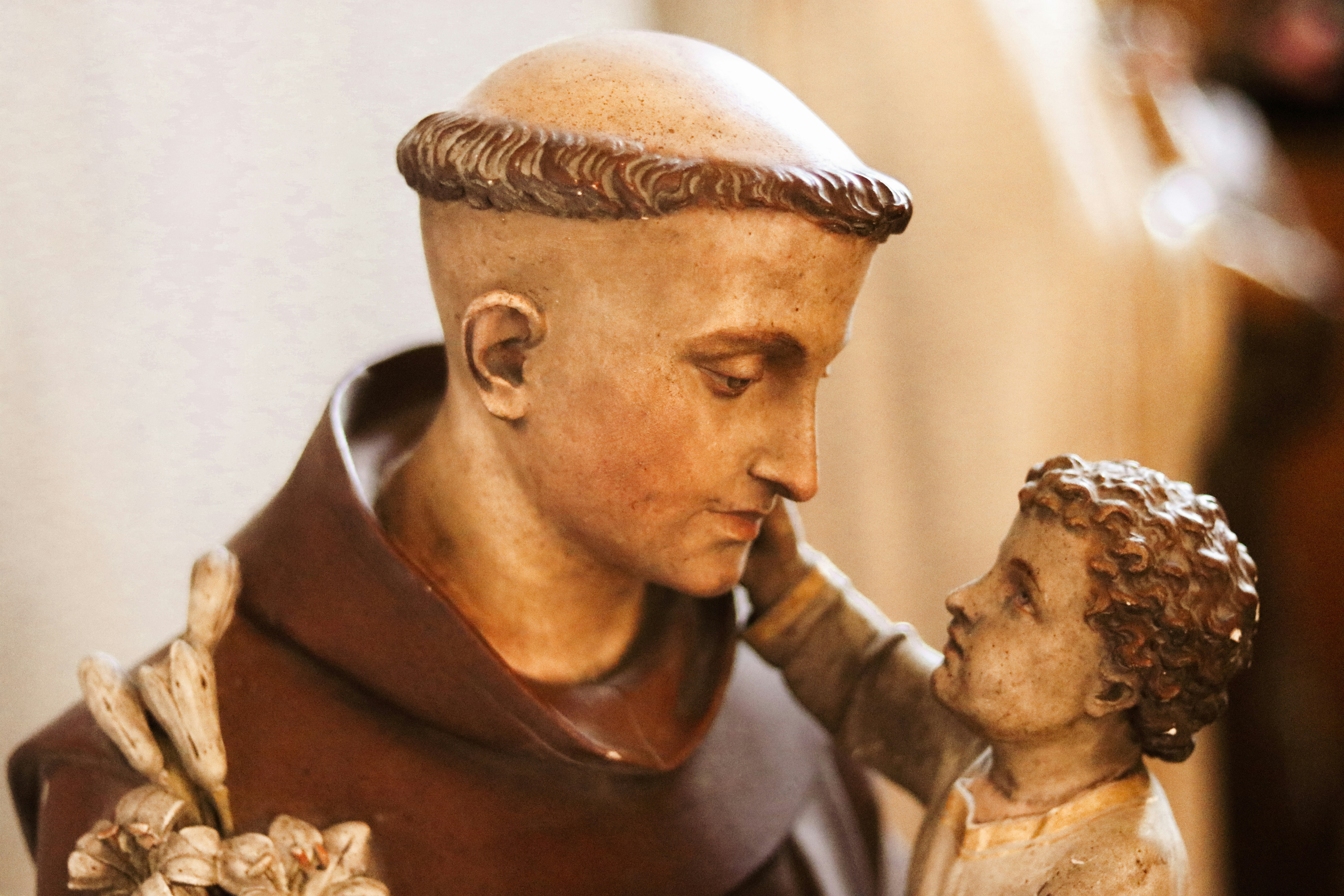 statue of saint anthony with a child