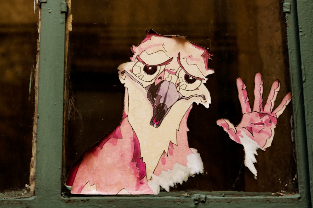 Personaje de pájaro y arte de espejo de vidrio de mano