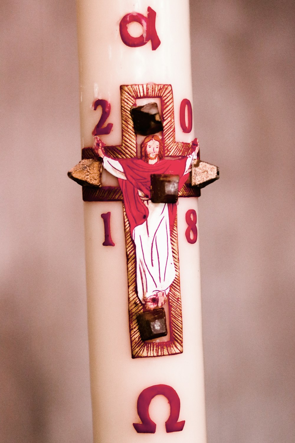red and brown crucifix decor