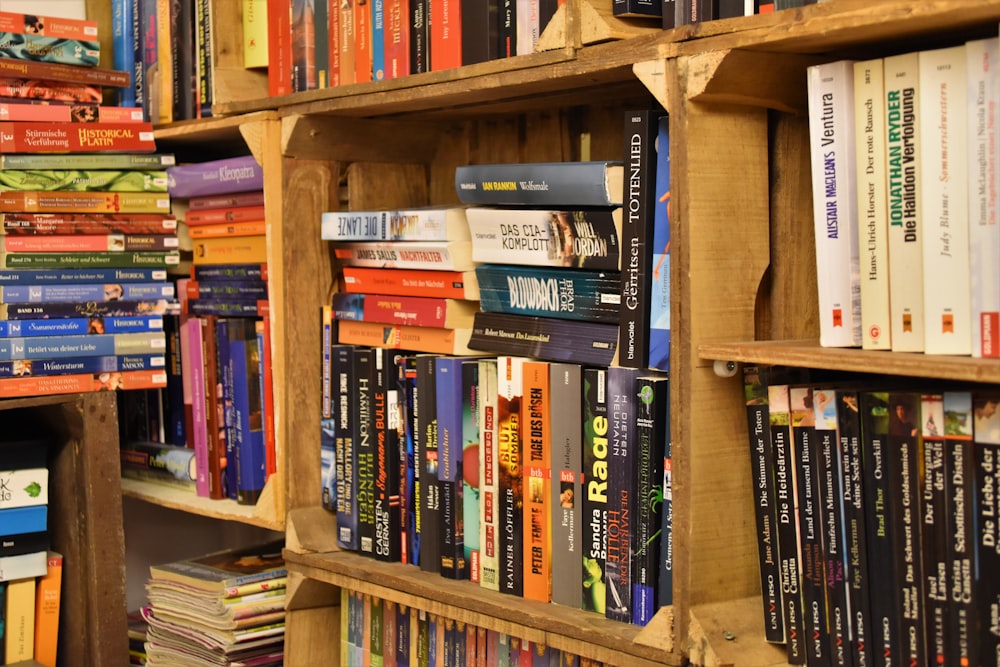 pile of books on bookshelf