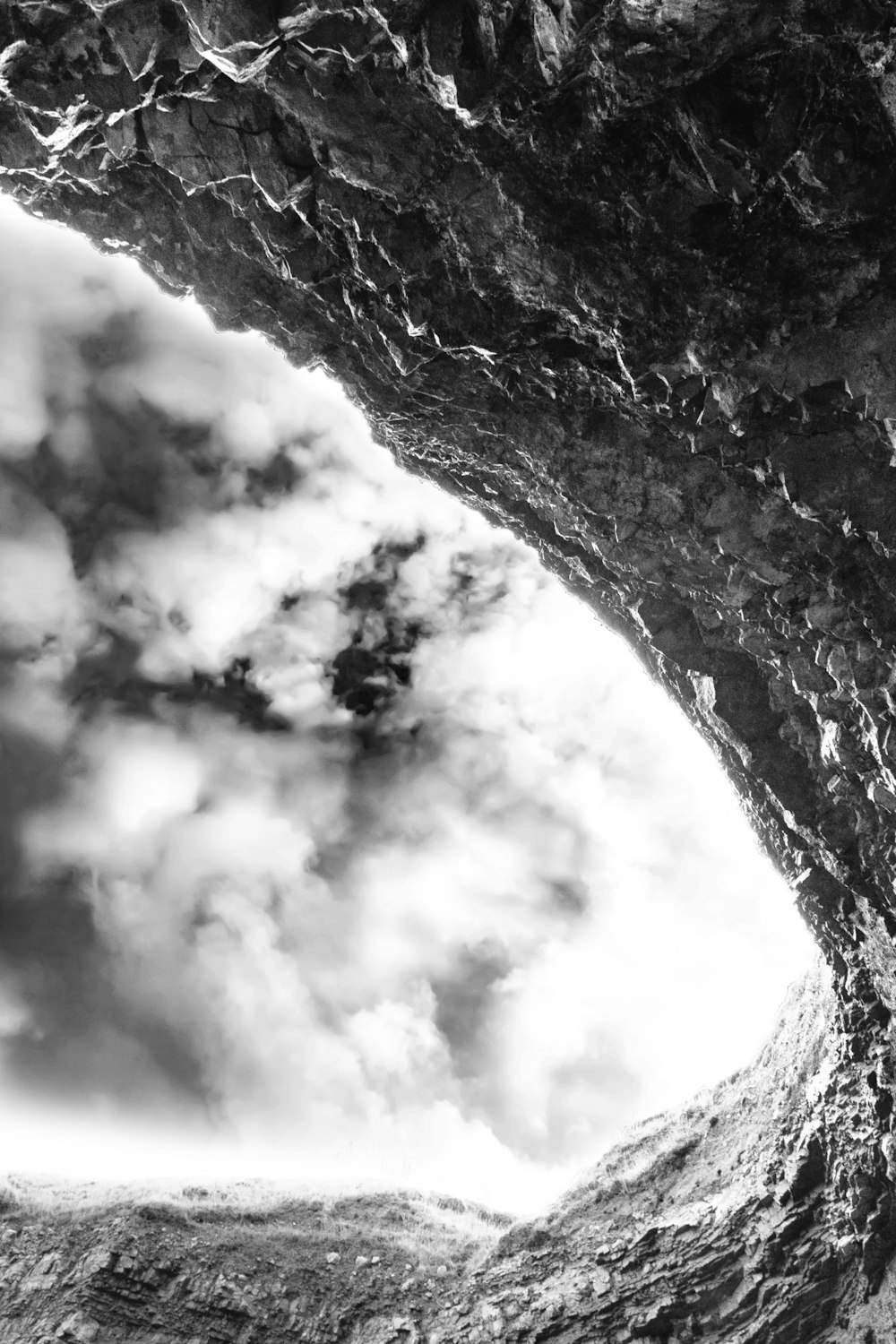 a black and white photo of a sky and clouds