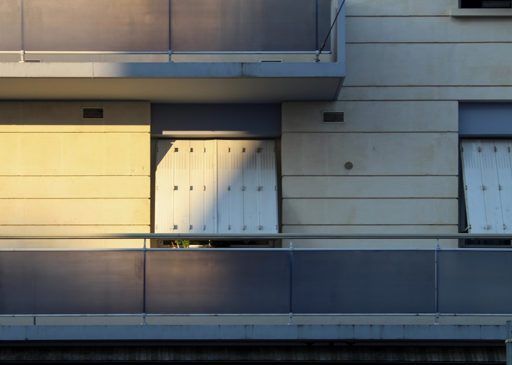 white window cover during daytime