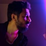 shallow focus photo of man in black top