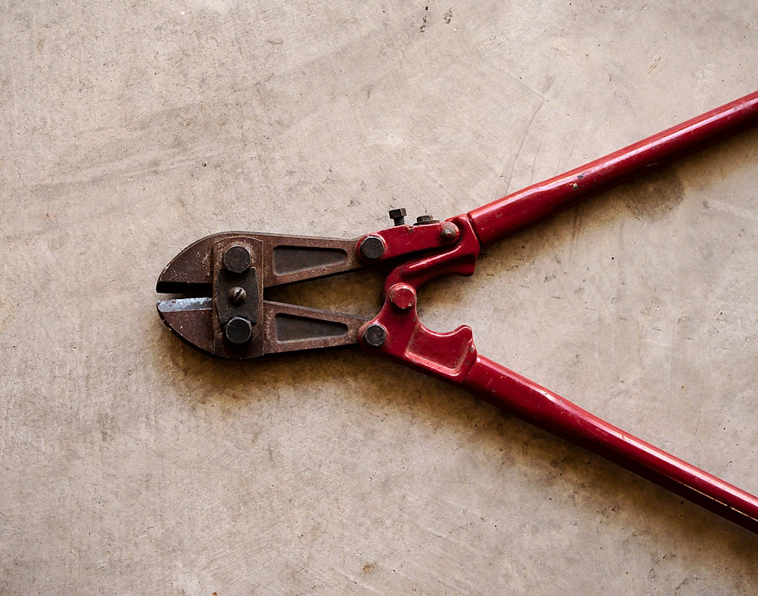 Trusty old tool photographed on the garage floor.   

Interesting how you sometimes never notice what is right there before you everyday.  The background has an effect like a filter was applied…actually, the garage floor just turns out to be rather interesting when examined up close.