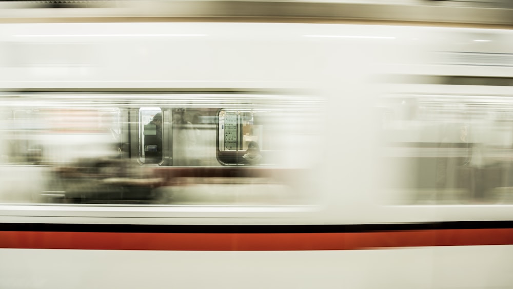 a blurry photo of a train passing by