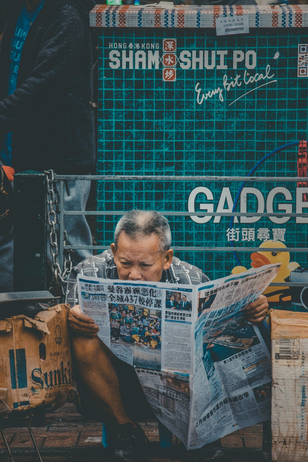 man reading newspaper