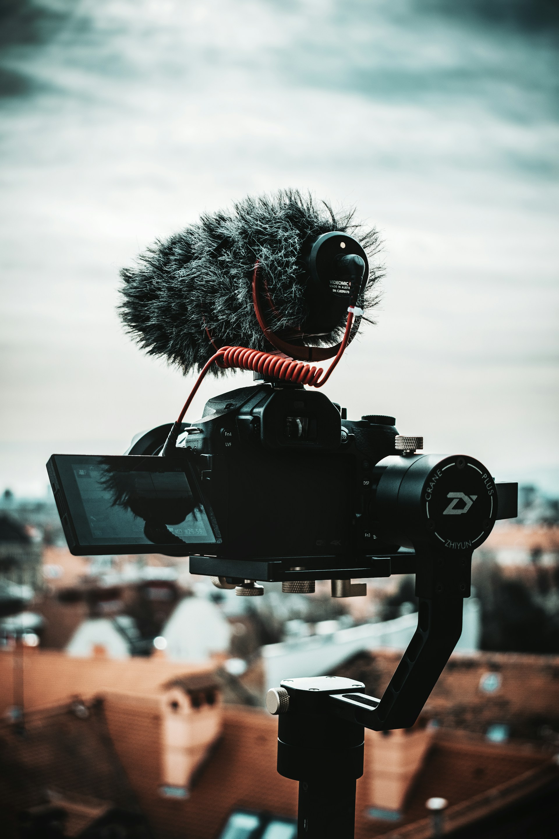 black camcorder with monopod