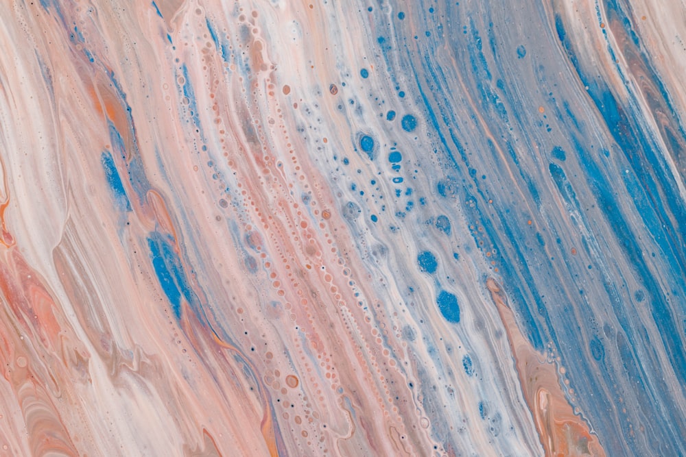 an abstract painting with blue, pink, and orange colors