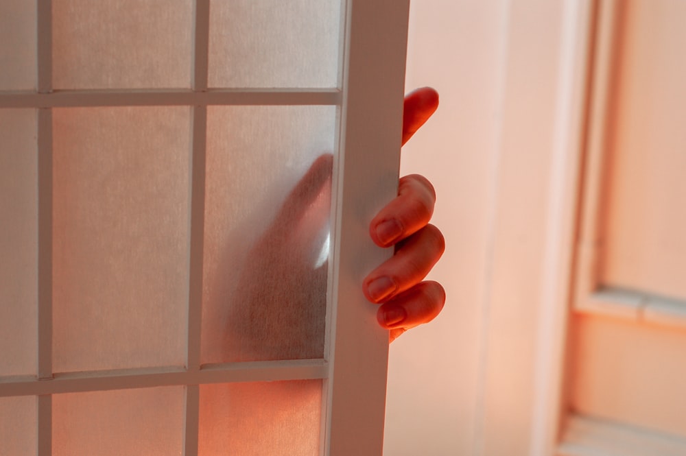 person holding slide door