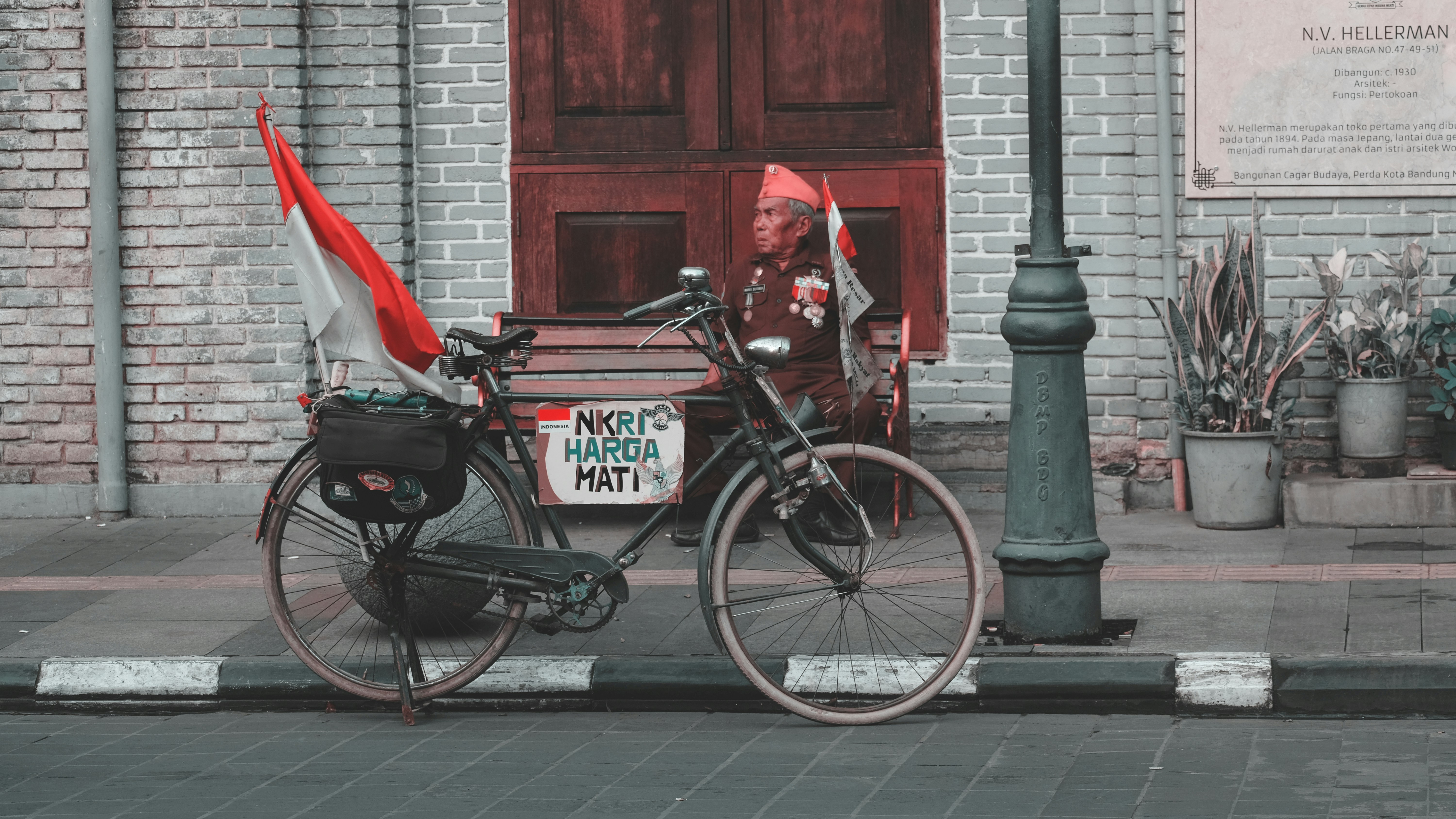 black commuter bike on roadside