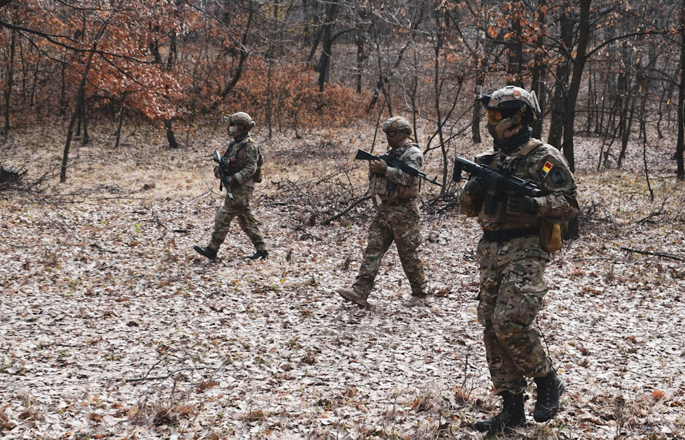 three soldiers at the forest