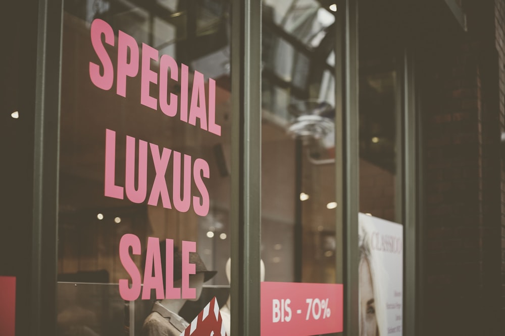 Special Luxus Sale vinyl sticker on glass wall