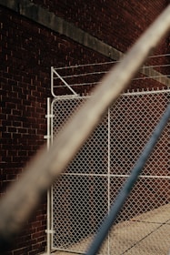 Realistic image of finished chain link fences stacked and ready for delivery in the warehouse.