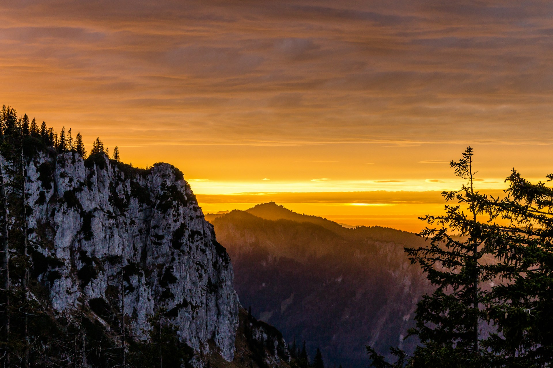 woman wearing yellow long-sleeved dress under white clouds and blue sky during daytime