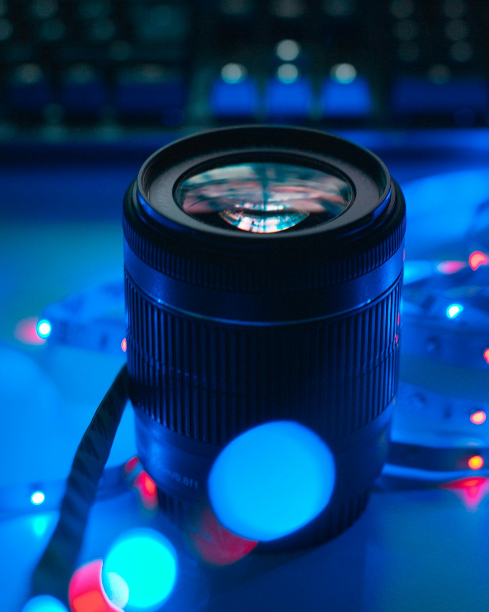 black camera lens with bokeh effect