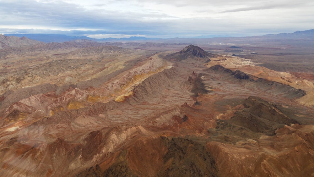 brown terrains view during daytime