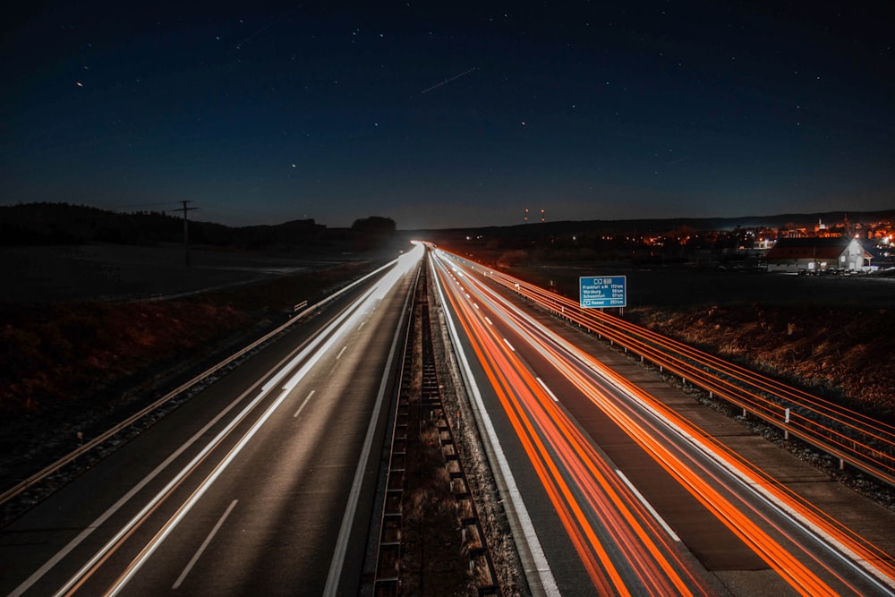 time lapse and light streaks of vehicle on road