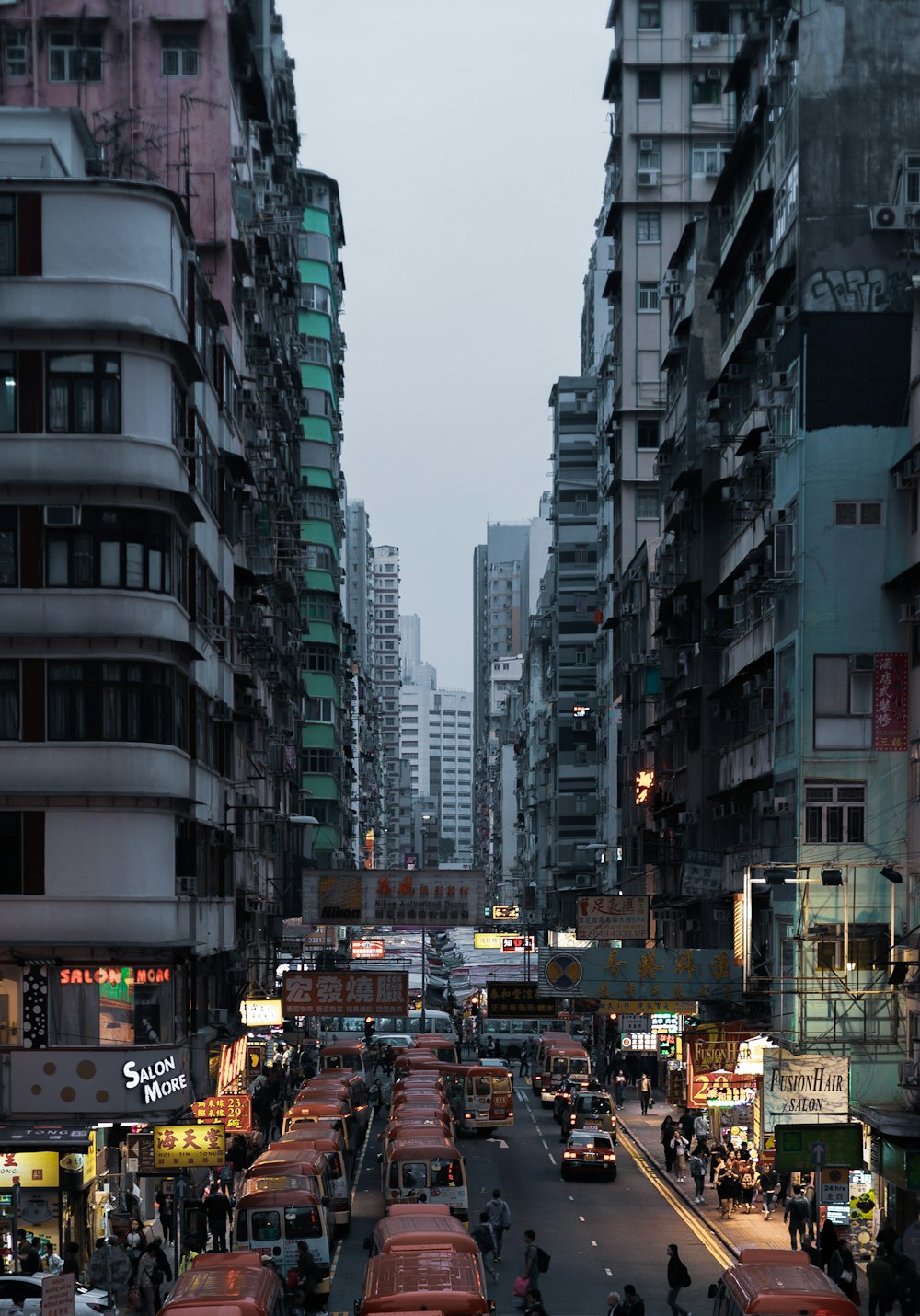 cars on road near buildings