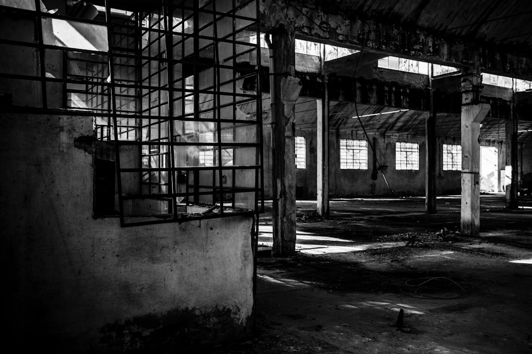 grayscale photo of interior of buildi ng