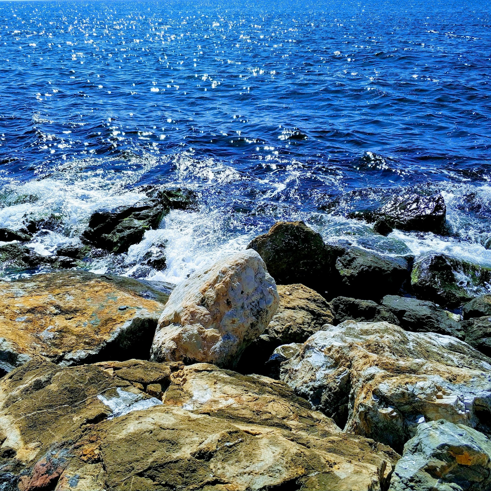 woman wearing yellow long-sleeved dress under white clouds and blue sky during daytime