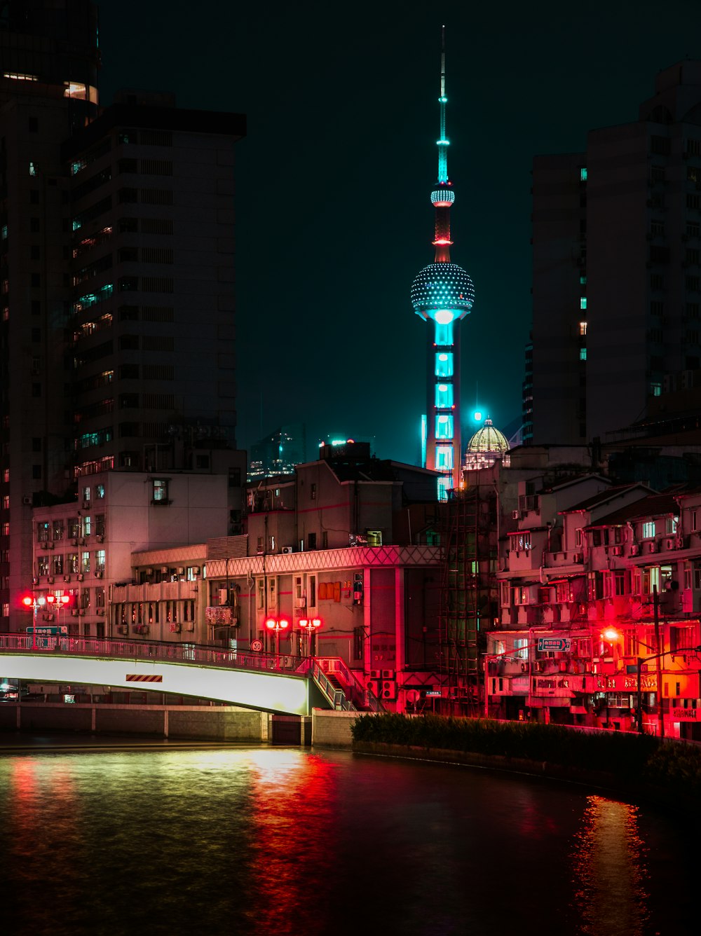 body of water beside buildings