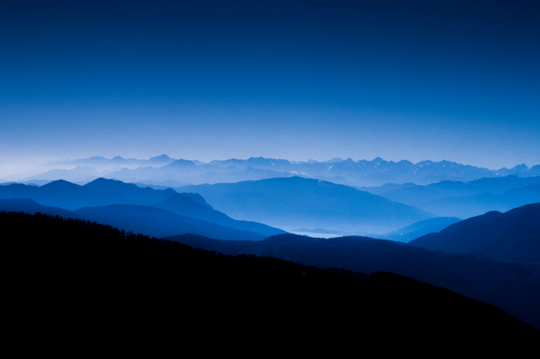 Layered blue mountain ridges