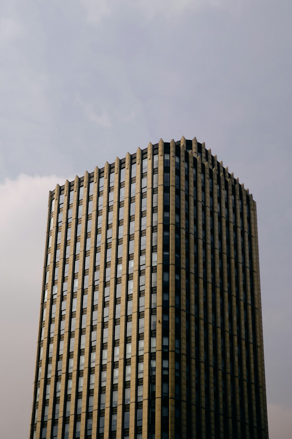 brown concrete high-rise building