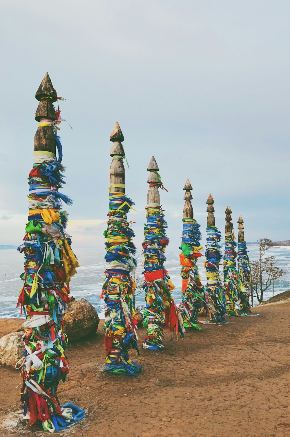 blue and gray poles on shore