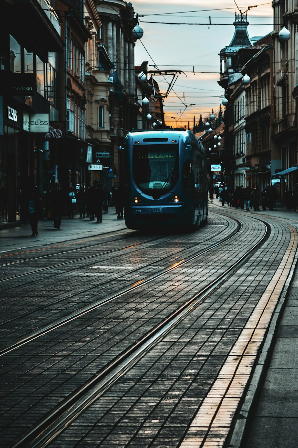gray tram outdoor during daytime