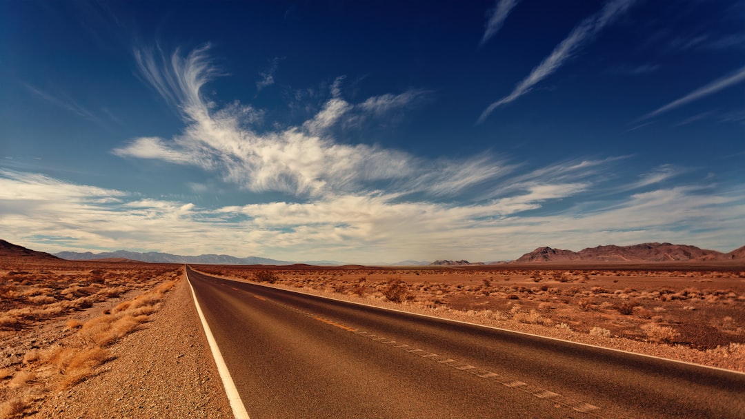 brown concrete road during daytie