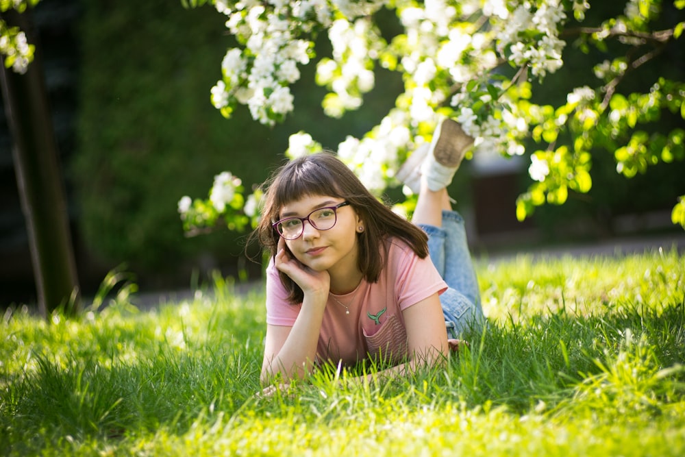 girl planking on grass