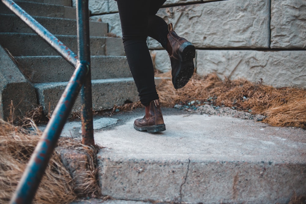 pair of brown leather boots