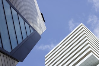 low-angle photography of white concrete building