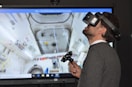 man playing VR goggles