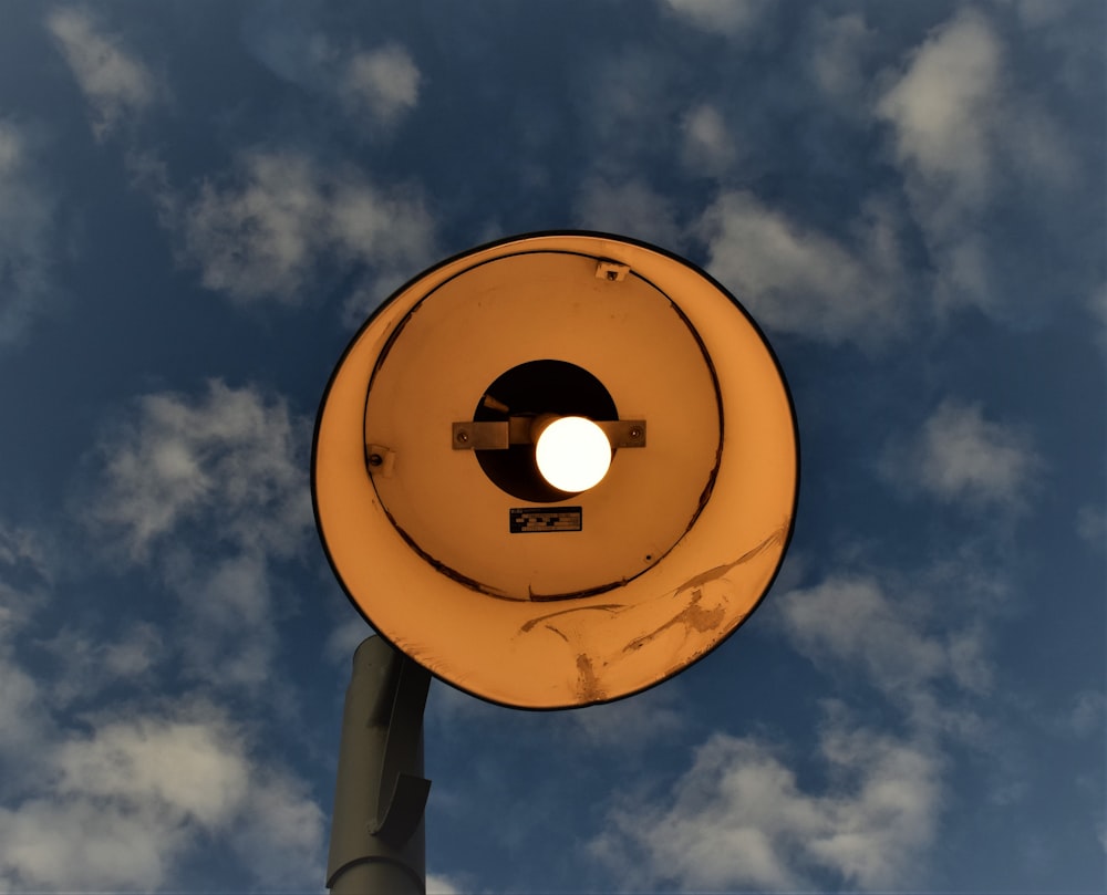 low-angle photography of light post