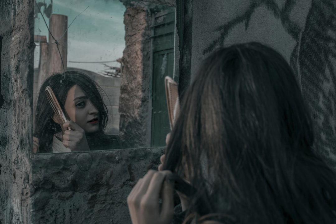  woman combing her hair comb