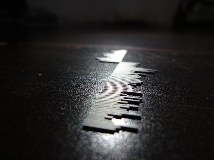 Close-up of a thermal barcode label roll on a wooden table