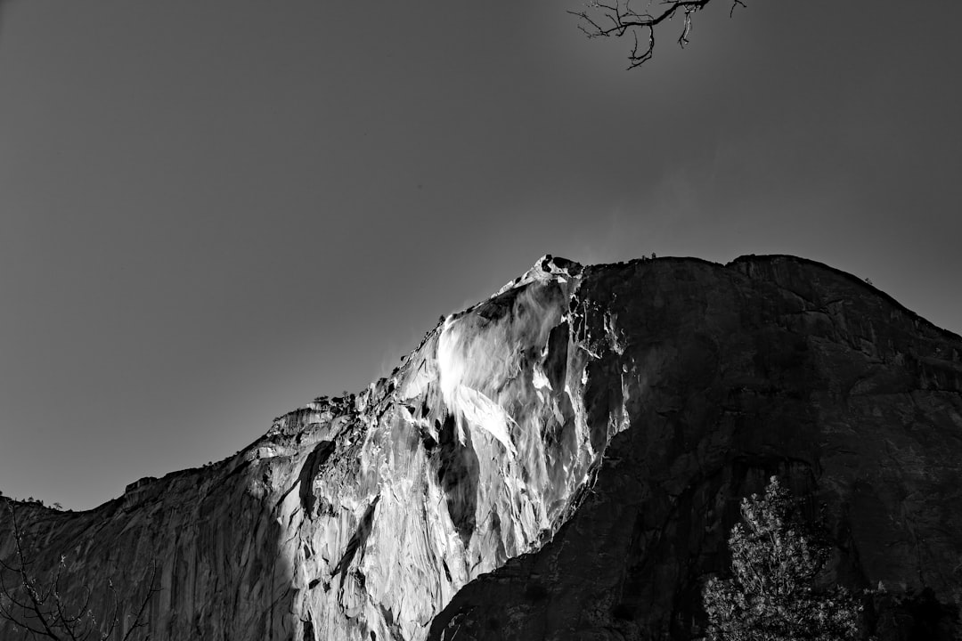 grayscale low angle photography of mountain