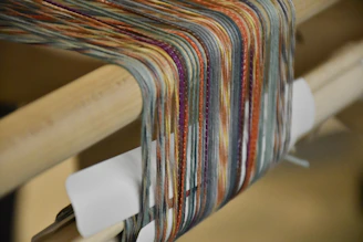 A vibrant network of colorful threads weaving together in harmony.