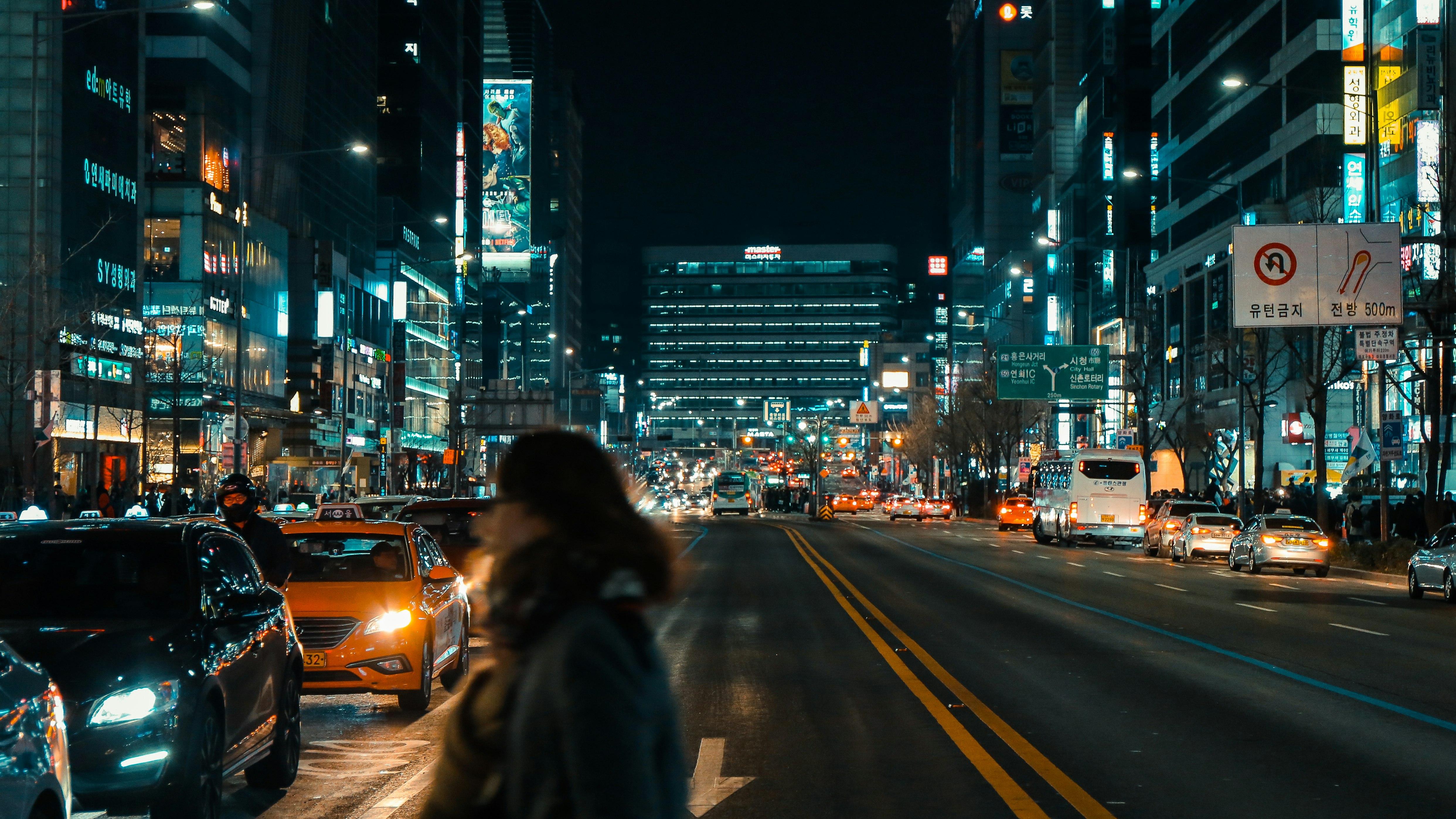 woman about to cross on the road