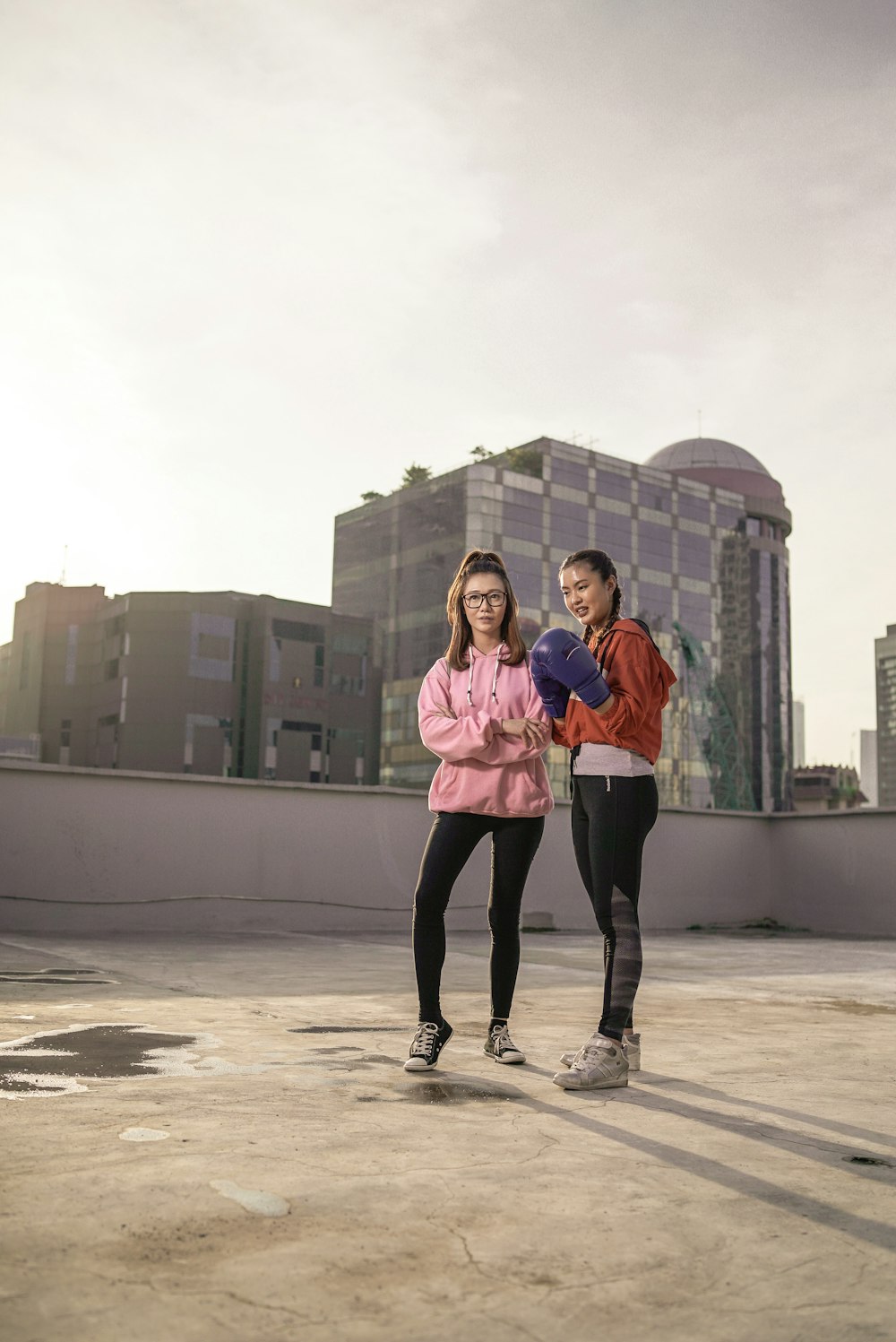 two women on top of the building