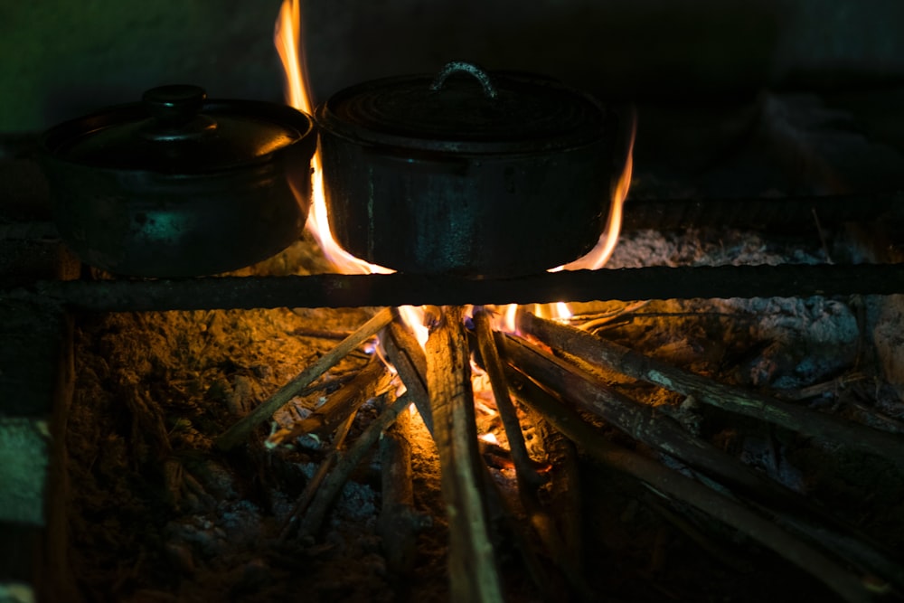 a black pot on a firepit