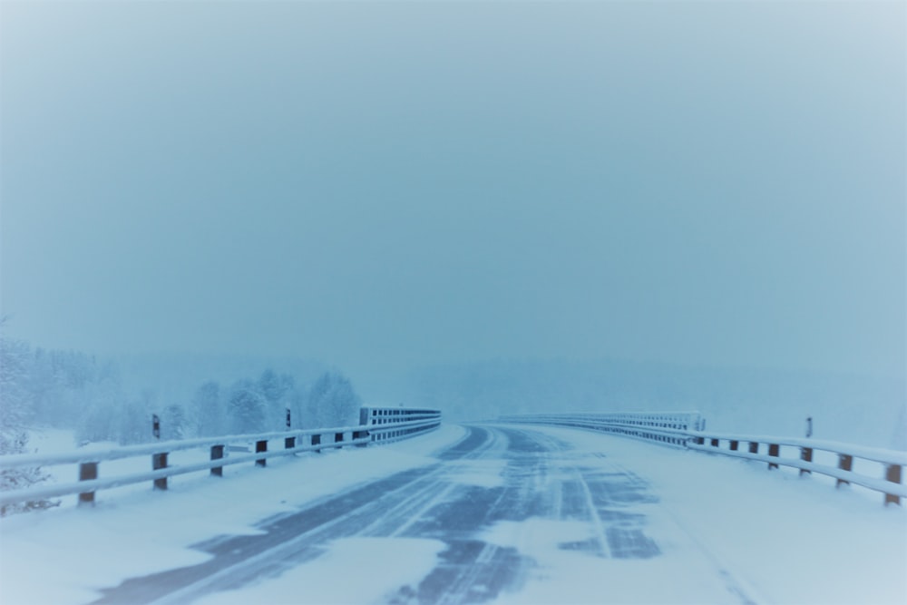 snow covered empty road