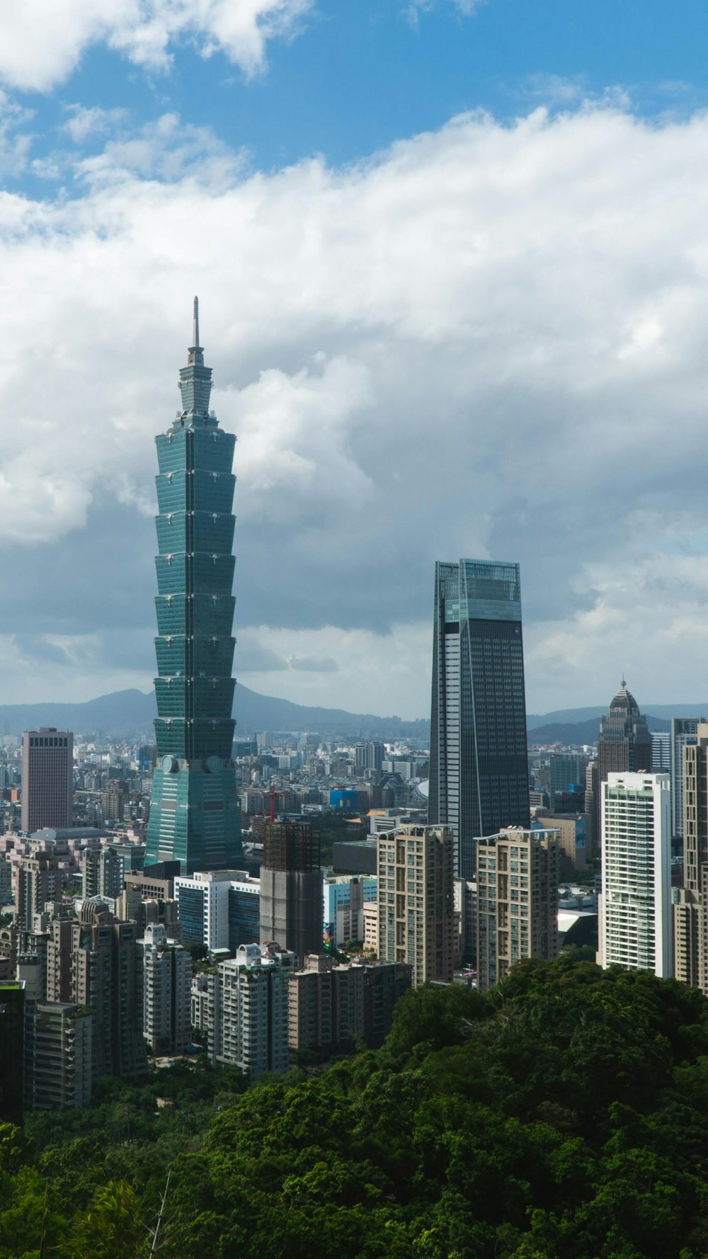 a view of a city with tall buildings